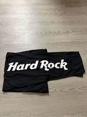 Unisex  black Hard Rock joggers feature a large vertical logo Size 2XL